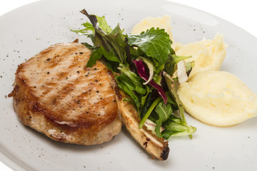 Grilled pork with salad and potato
