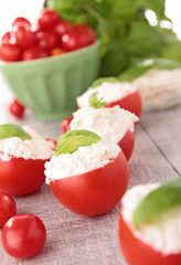 stuffed tomato with cheese and basil