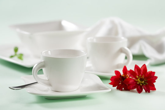 cups with flowers