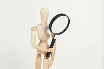 Looking through magnifying glass