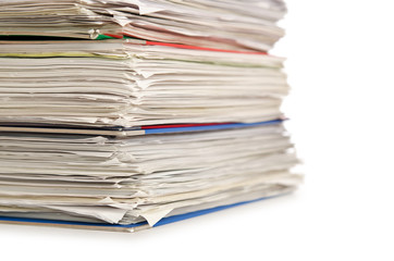 Pile of papers on white