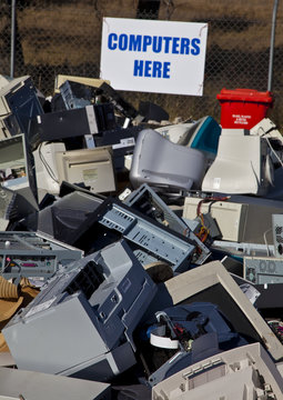 Computers and monitors piled up for recycling