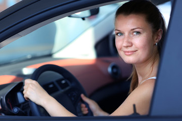 Fototapeta na wymiar Smiling female driver