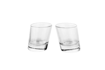 Two shot glasses isolated on white