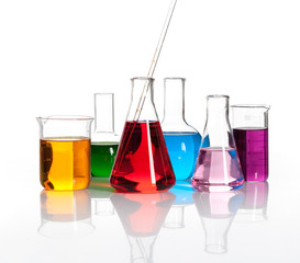 Various laboratory flasks with a colored reagents, isolated