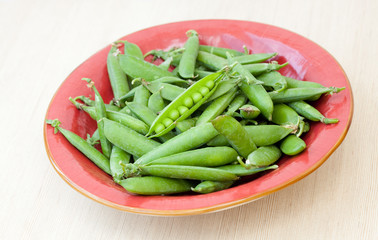 Peas pods on a plate