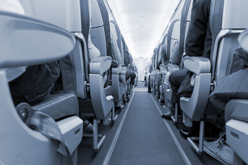 rows of seats on airplane - 43781474