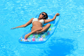 Woman Relaxing in a pool