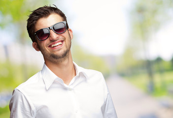 Happy Young Man Wearing Glasses