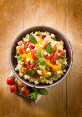 vegetarian couscous with tofu capsicum tomatoes mint and capers