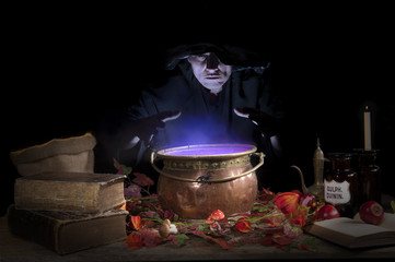 halloween witch with cauldron