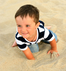Boy plays the seashore