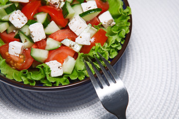 Fresh salad with tomatoes and cucumbers. green..