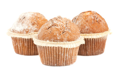 Three muffins on white background