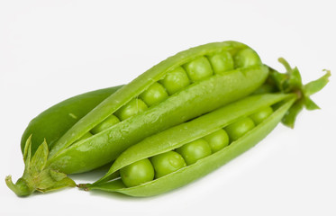 fresh green peas isolated on a white background