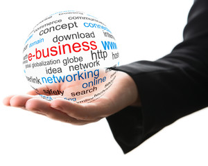 Fototapeta premium Transparent ball with word e-business in a hand