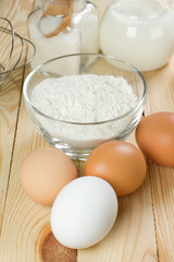 Basic ingredients for dough. Milk, eggs and flour.