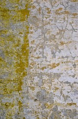 Ancient collapsing old building wall background.