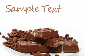 Chocolate and coffee beans on sacking.