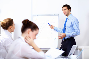 Fototapeta premium Young businessman in the office