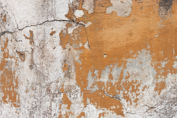 Badly damaged plaster wall background