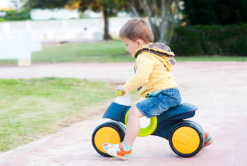 boy on a bicycle without pedals