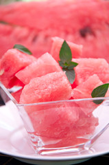 fresh watermelon pieces with mint in bowl 