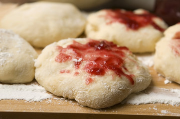Sweet doughnuts with rose marmelade
