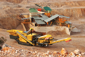 Fototapeta premium yellow career excavator in a quarry