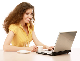 A young beautiful woman with a laptop