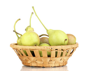 ripe pears in basket isolated on white.