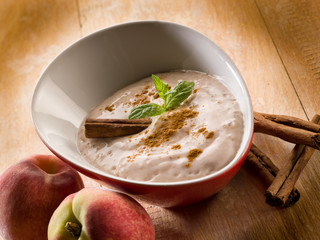 peach mousse with cinnamon and mint leaf