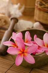 Fototapeta na wymiar tropical spa with frangipani flowers