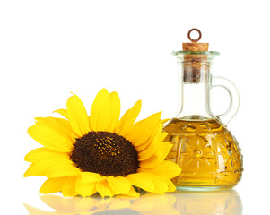 Obraz na płótnie Canvas oil in bottle and sunflower, isolated on white