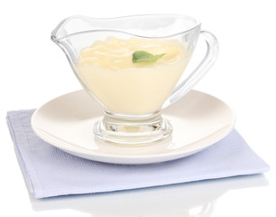 Mayonnaise in bowl on napkin isolated on white
