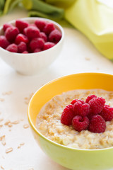 Oatmeal porridge with fresh raspberry