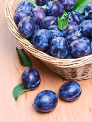 plums in basket