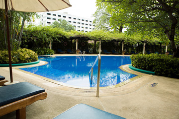 Swimming pool with relaxing seats