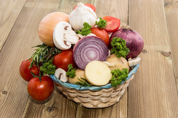A basket filled with different vegetables