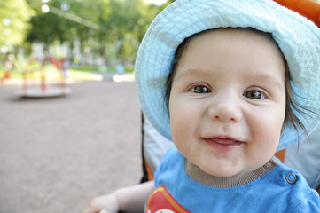 Portrait very happy baby in hat