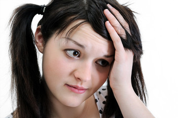 Naklejka premium pensive young woman looking away