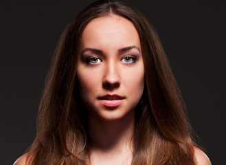 alluring woman over dark background