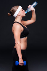 fitness woman drinking water