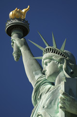 Close-up Portrait of Statue of Liberty Bright Blue Sky
