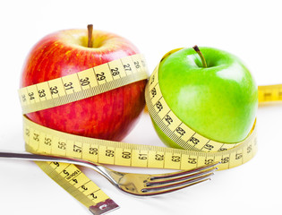 green apple with measure tape