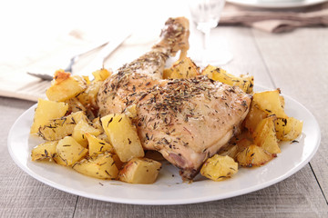 grilled chicken leg and potato
