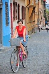 girl riding retro bicycle