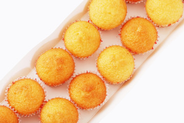 Stacked muffins isolated on white background
