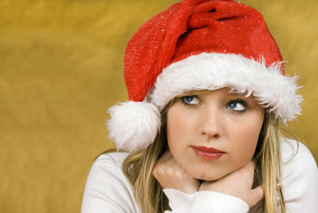 Beautiful girl with santa claus cap