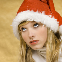 Beautiful girl with santa claus cap